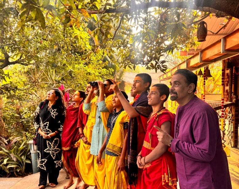 Group of people birdwatching.