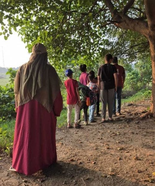 A group of people walking.