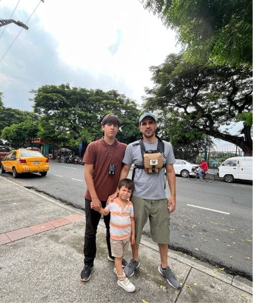 Three smiling people.